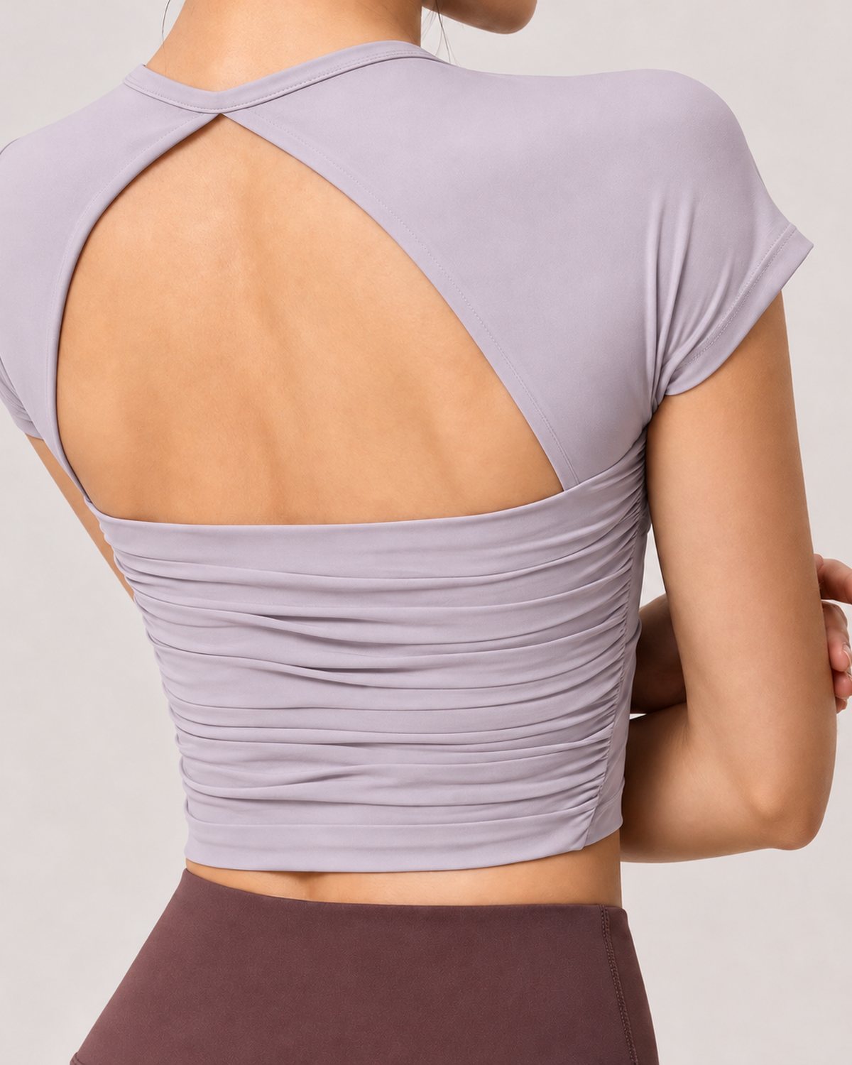 RYZ Enhance Mesh Fusion Top in Lavender, close-up of ruched open back