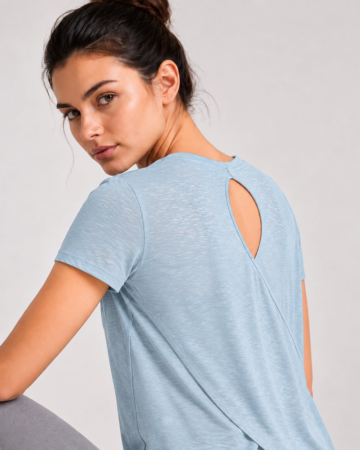 RYZ Softretch Cross-Flow Breeze Tee in Sky Blue, close-up of keyhole back