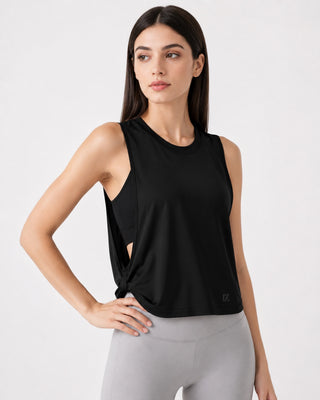 Woman wearing RYZ Original Core Layer Tank in black, front view