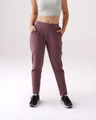 Woman wearing RYZ Enhance All-Day smart pants in lavender, front view