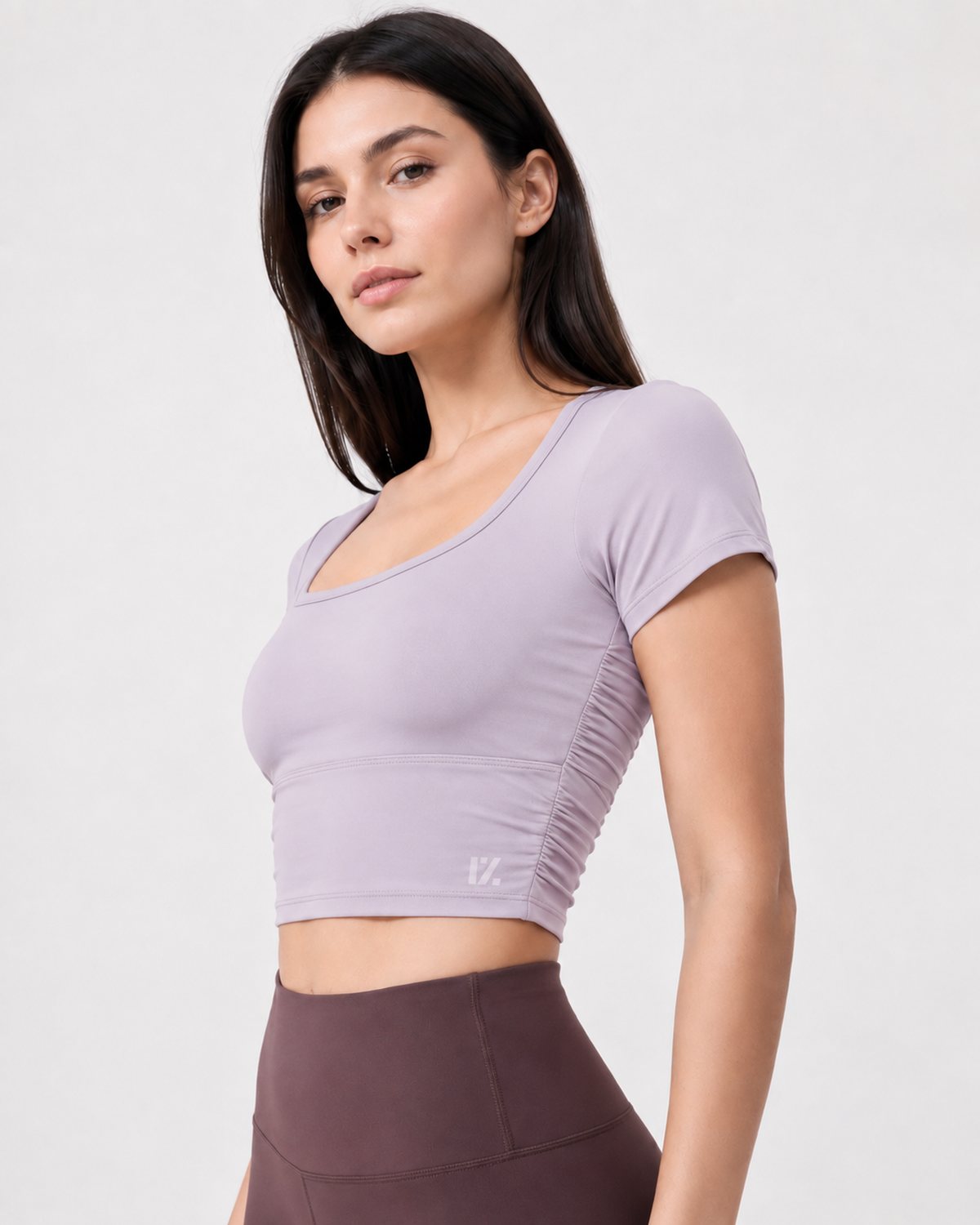 RYZ Enhance Mesh Fusion Top in Lavender, three-quarter front view